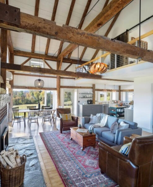 The open floor plan provided a blank canvas for an eclectic collection of furnishings & fixtures. We added LED tapes to the main beams to bounce glare-free light into the spaces.