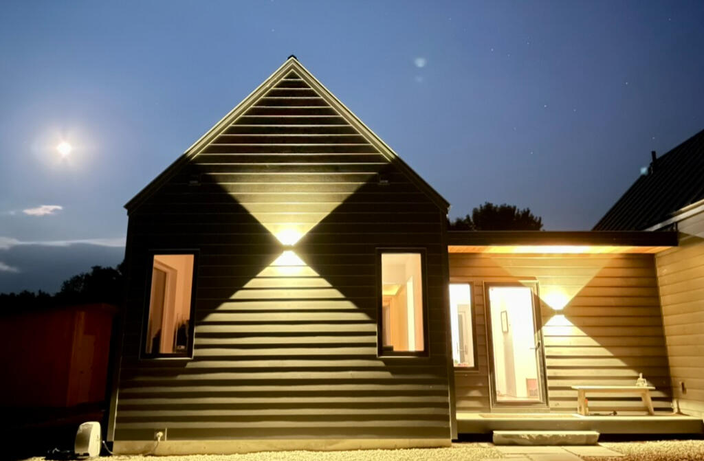 Exterior LEDs with moveable vanes to direct the light as desired.