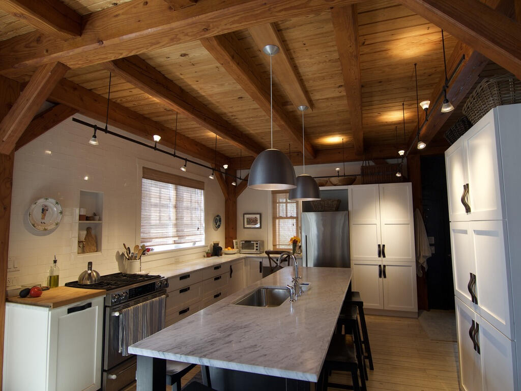 Modern Farmhouse - This Kitchen has a rail system for up and down-lighting for ambience & tasks, plus two island pendants.